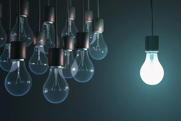 depositphotos_22380875-stock-photo-glowing-bulb-among-the-gray